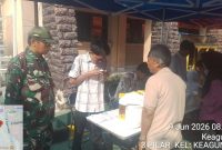 Babinsa Koramil 01/Taman Sari Monitoring 1.797 Warga Kelurahan Keagungan Terima Bantuan Pangan Nasional Bulog 2026