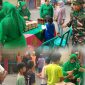 Wujud Kepedulian TNI Terhadap Sesama, Babinsa Koramil 01/TS Dampingi Ketua Persit KCK Ranting 2 Koramil 01/Taman Sari Bagikan Nasi Ayam Bakar ke Warga Kelurahan Keagungan